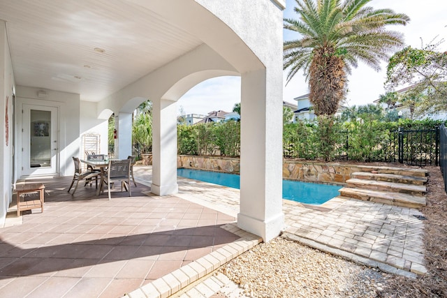 view of swimming pool featuring a patio