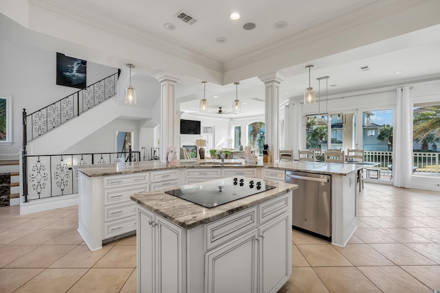 kitchen with pendant lighting, black electric cooktop, a center island, and dishwasher