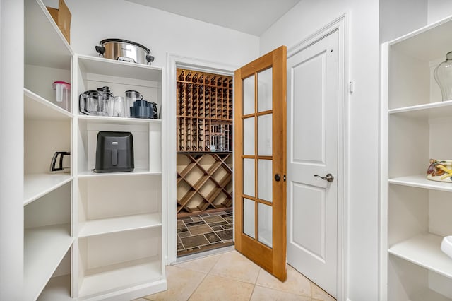 wine area with light tile patterned flooring