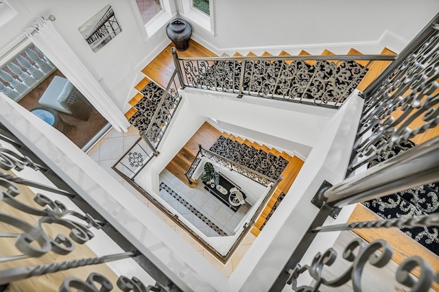 stairway with wood-type flooring