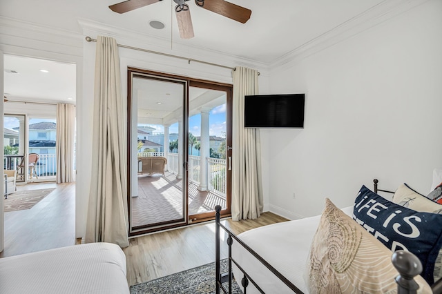 bedroom with ornamental molding, access to outside, light hardwood / wood-style floors, and ceiling fan