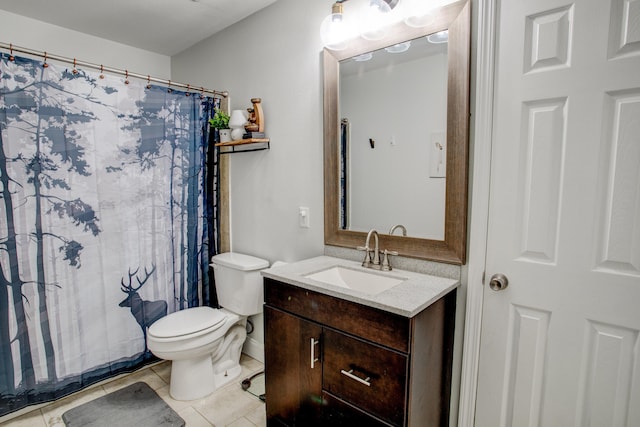 bathroom featuring tile patterned flooring, a shower with shower curtain, toilet, and vanity