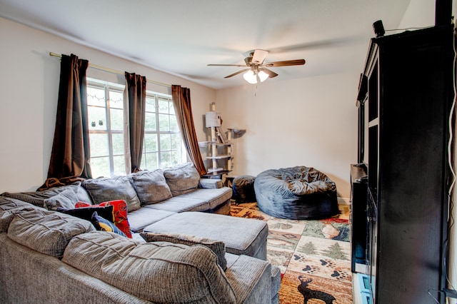 living area with ceiling fan