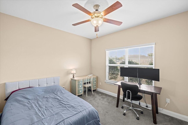 carpeted bedroom featuring ceiling fan and baseboards