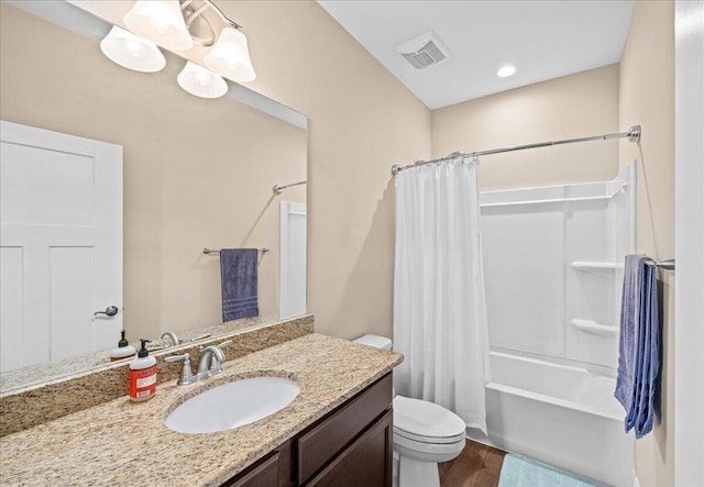 full bathroom with vanity, shower / tub combo, wood-type flooring, and toilet