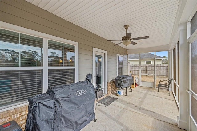 sunroom / solarium with ceiling fan