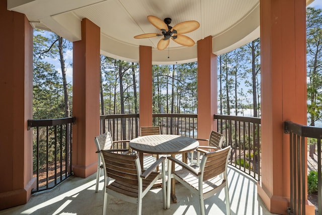 exterior space featuring ceiling fan