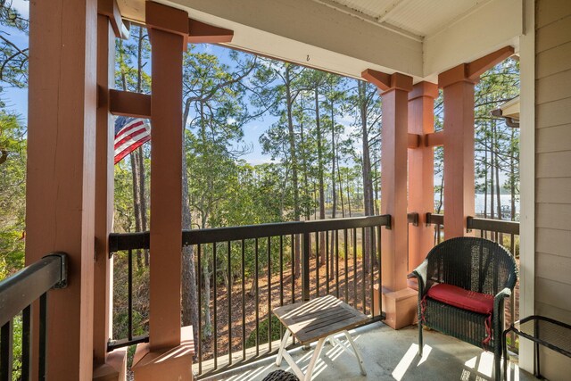 balcony featuring a water view