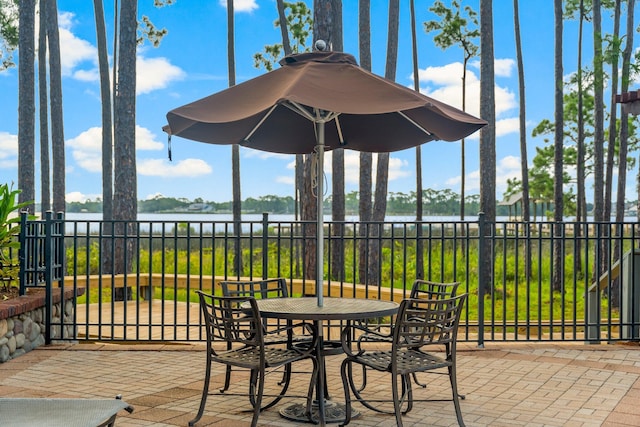 view of patio / terrace with a water view