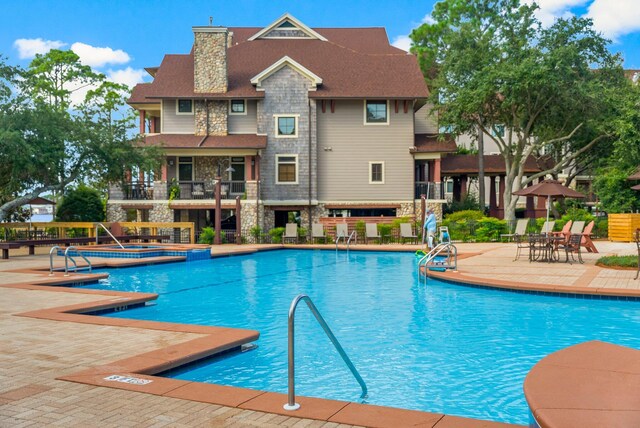 view of pool with a patio