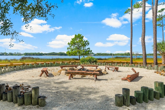view of jungle gym with a water view