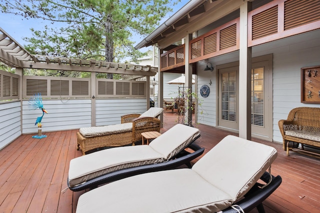 deck with outdoor lounge area and a pergola