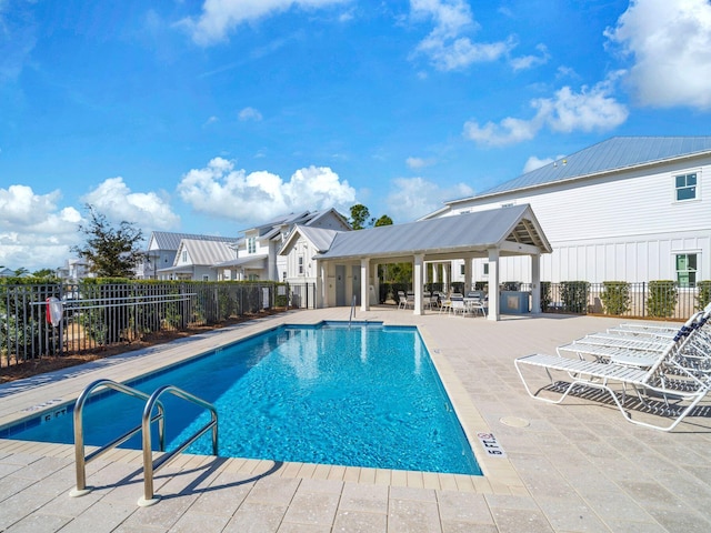 view of pool featuring a gazebo and a patio area