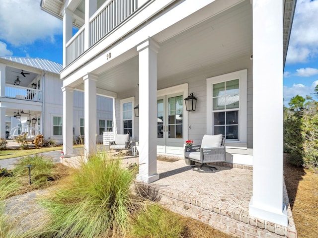 view of patio / terrace with a balcony