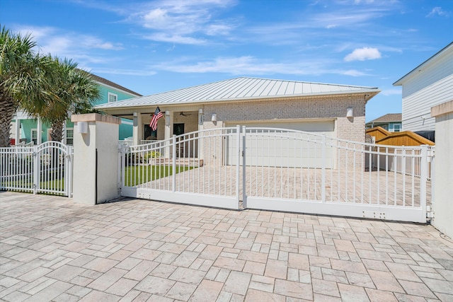 ranch-style home featuring a garage