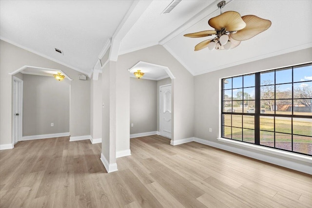 2185 Calle De Castelar, Navarre, FL 32566 - unfurnished living room with ceiling fan, ornamental molding, vaulted ceiling, and light hardwood / wood-style flooring