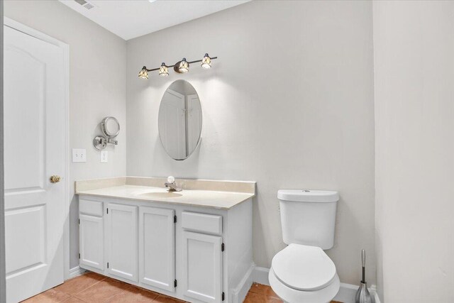2185 Calle De Castelar, Navarre, FL 32566 - bathroom featuring tile patterned flooring, vanity, and toilet