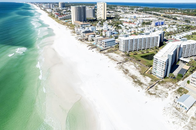 bird's eye view featuring a beach view and a water view