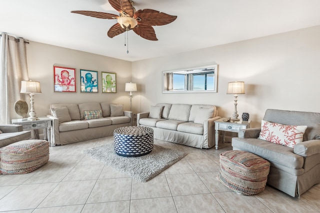 tiled living room featuring ceiling fan