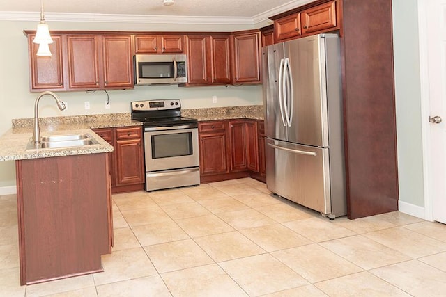 kitchen featuring light tile patterned flooring, sink, ornamental molding, appliances with stainless steel finishes, and pendant lighting