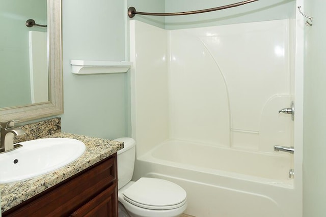 full bathroom with vanity, shower / washtub combination, and toilet