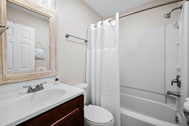 bathroom featuring toilet, shower / bath combo, and vanity