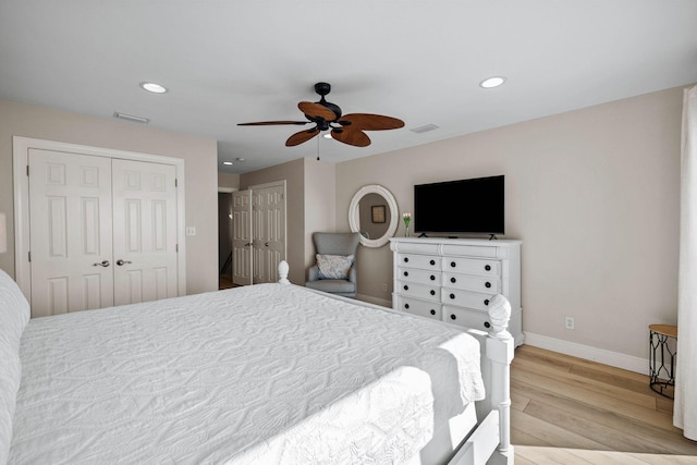 bedroom featuring recessed lighting, light wood-style floors, visible vents, and baseboards