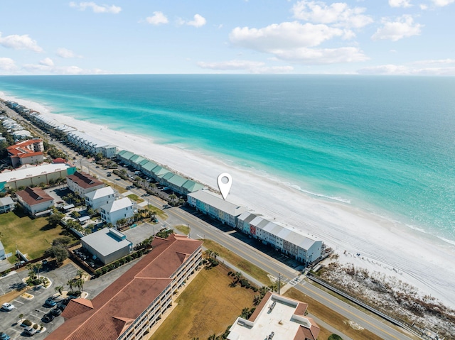 bird's eye view with a view of the beach and a water view