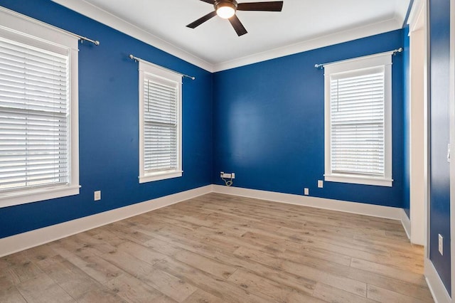 unfurnished room with ornamental molding, ceiling fan, and light hardwood / wood-style floors