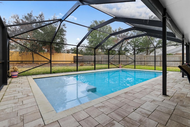 view of pool with a lanai and a patio