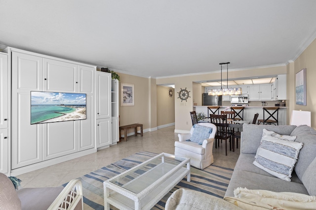 living room featuring light tile patterned flooring, crown molding, and baseboards