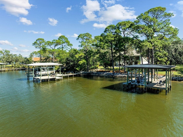 view of dock with a water view and boat lift