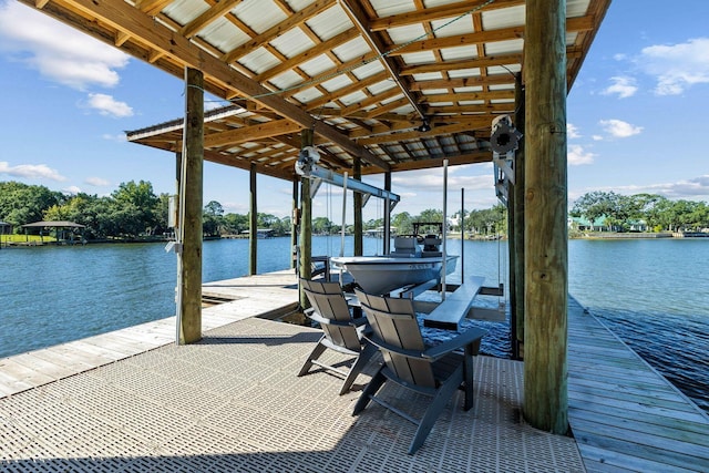 view of dock with a water view and boat lift