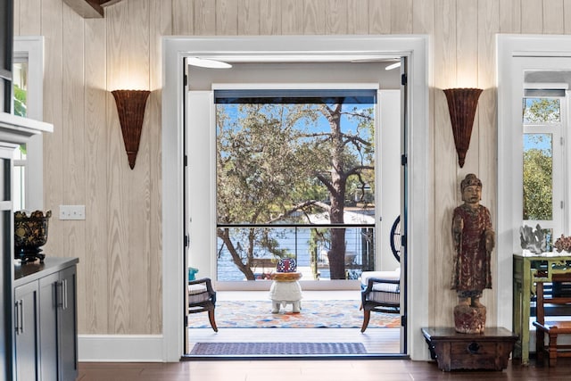 doorway to outside featuring wood finished floors