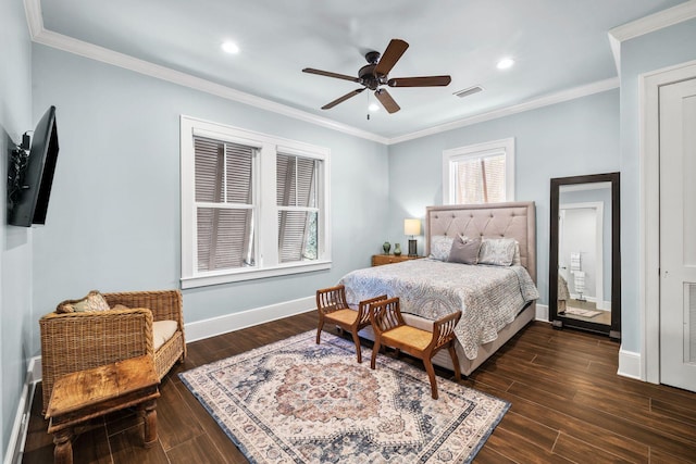 bedroom with baseboards, visible vents, dark wood-type flooring, crown molding, and recessed lighting