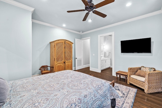 bedroom with ornamental molding, baseboards, and wood finished floors