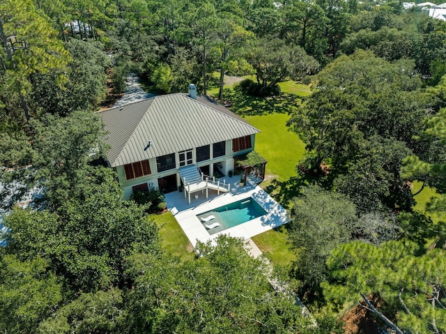 bird's eye view with a forest view