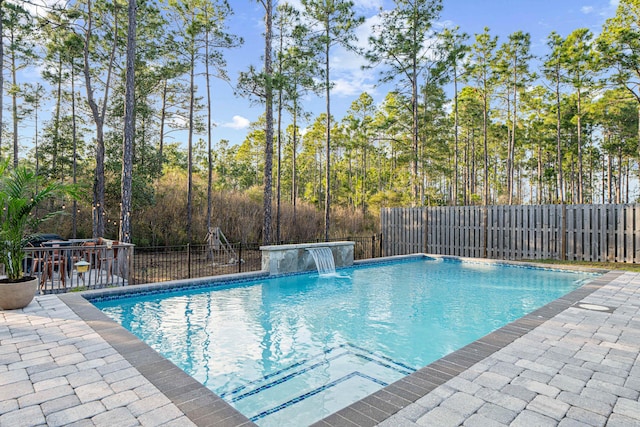 view of pool with a patio