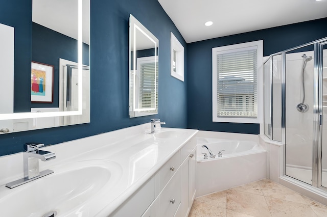 bathroom featuring vanity, tile patterned floors, and shower with separate bathtub