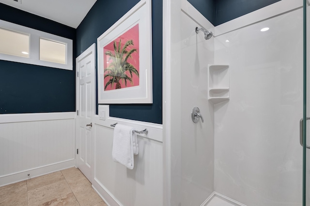 bathroom featuring tile patterned flooring and a shower