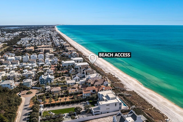 aerial view featuring a view of the beach and a water view