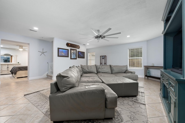 living room with light tile patterned floors, recessed lighting, visible vents, baseboards, and a ceiling fan