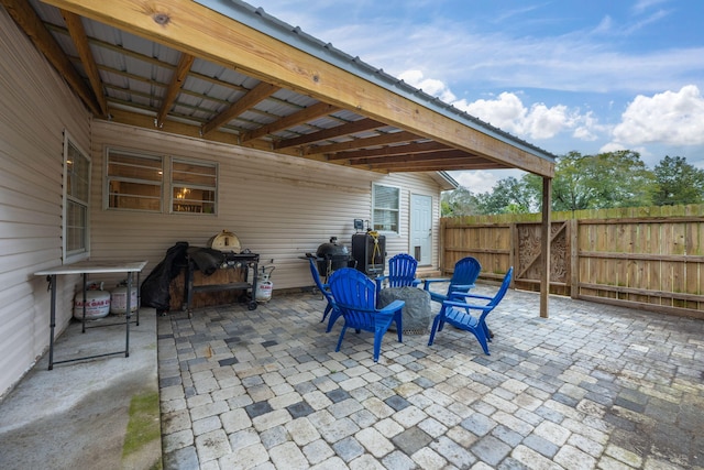 view of patio / terrace featuring a gate and fence