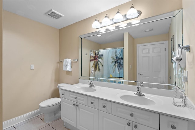 bathroom featuring vanity, a shower with curtain, tile patterned floors, and toilet