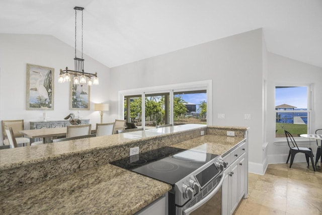 kitchen with stainless steel range with electric stovetop, stone countertops, decorative light fixtures, and lofted ceiling