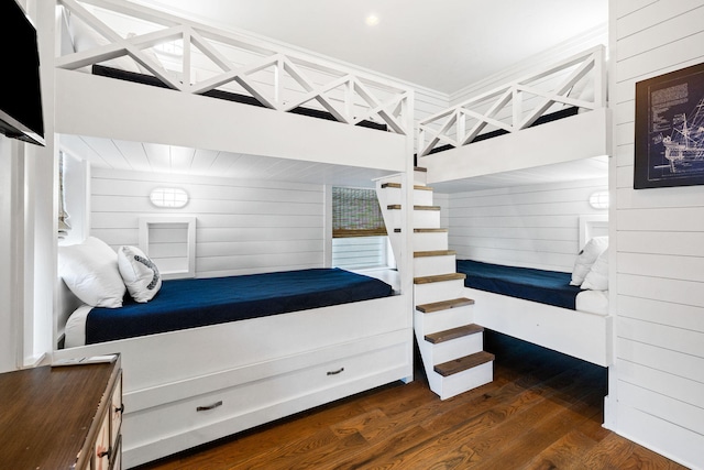 bedroom featuring dark hardwood / wood-style flooring