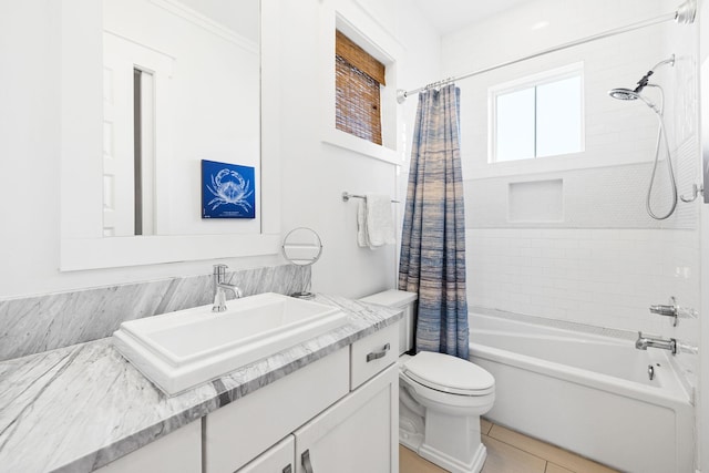 full bathroom with vanity, toilet, and shower / tub combo