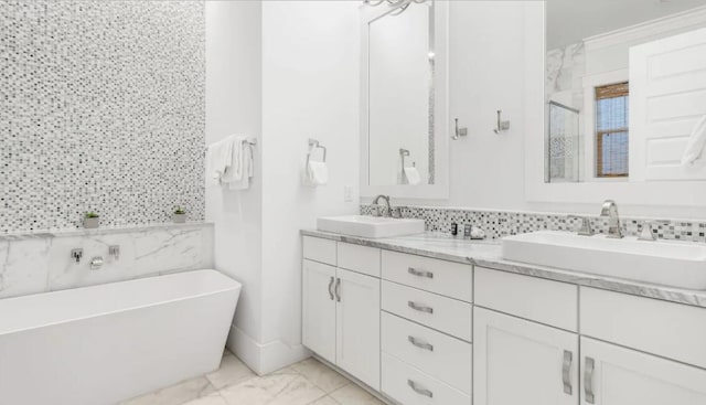 bathroom with vanity and separate shower and tub