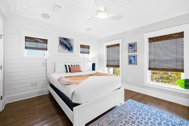 bedroom featuring dark wood-type flooring and ceiling fan