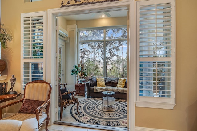 sitting room featuring tile patterned flooring